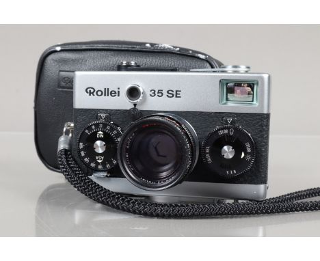 A Rollei 35 SE Compact Camera, chrome, made in Singapore, shutter working, not battery checked, body G-VG, with HFT 40mm f/2.