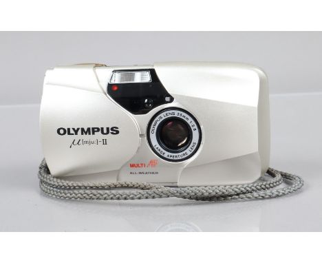 An Olympus mju II Compact Camera, silver, powers up, shutter working, flash working, self timer working, body G-VG, elements 