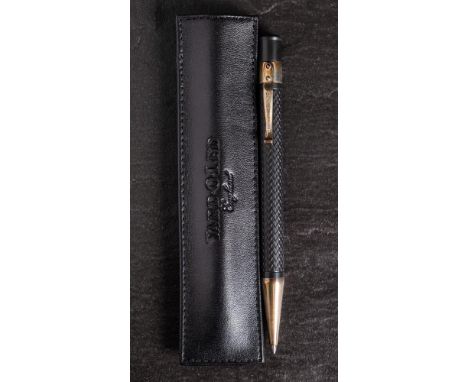 A silver mounted 'Yard-O-Led ball point pen: with black chequered body.