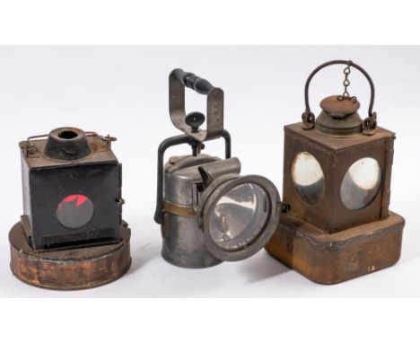 A  LNER Welch pattern hand lamp with plaque 'Retford': together with a LNE Premier hand lamp and one other unsigned lamp burn