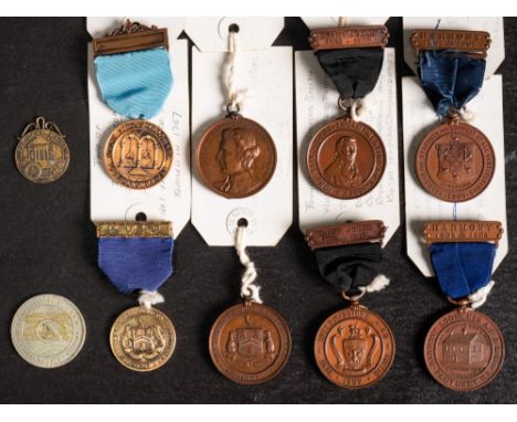 Of American Masonic Interest. A group of USA Masonic jewels: comprising two 100th Anniversary medals for Harmony Lodge, 1905,