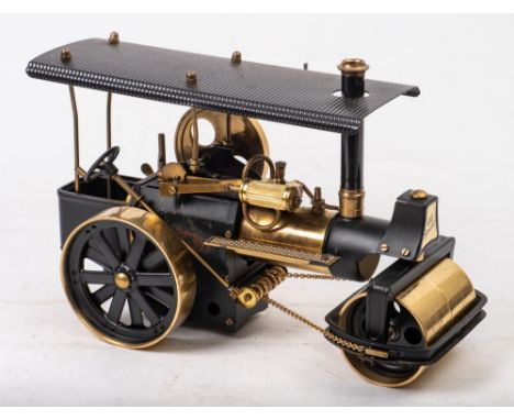 Wilesco (West Germany) A D376 live steam road roller and traction engine 'Old Smokey': in black and gold colour finish, toget