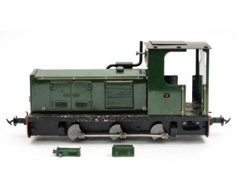 Roundhouse or similar. An O gauge  0-6-0 diesel locomotive: green with black chassis and numbered '3' to cab, (used condition