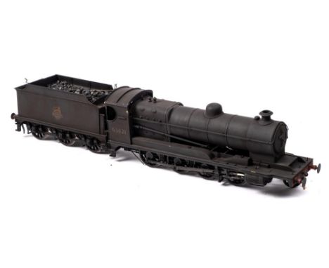 A kit built O gauge model of a BR  Class 04/3 2-8-0 locomotive and tender No 63821: black with weathered finish. 