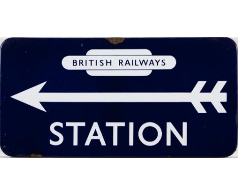 A  BR(E) enamel station direction sign  'Station': with British Railways totem  and left facing arrow, flanged edges, 27 x 53