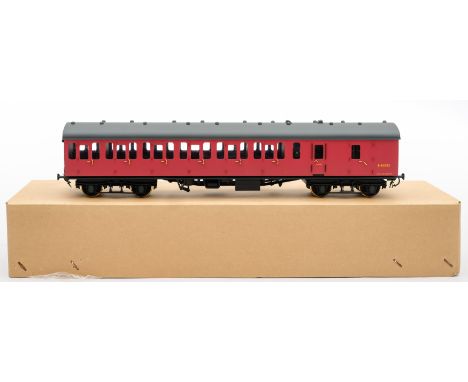 SBB (China) an O gauge model of a Suburban Brake coach in maroon: