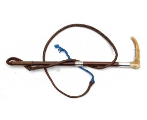 A silver mounted  antler handled hunting whip by Swaine & Adney: the leather shaft with two silver ferrules one inscribed ' K