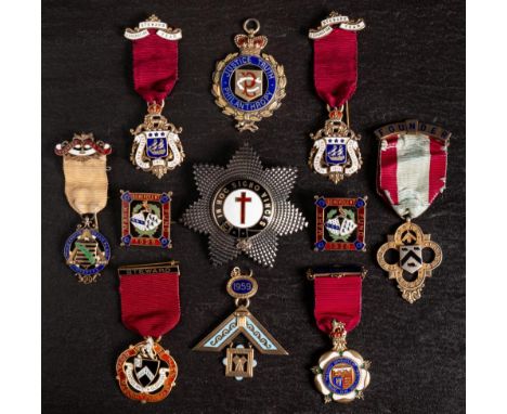 A collection of early 20th century Masonic jewels: including a cased silver and enamel Masonic Knights Templar sash badge by 