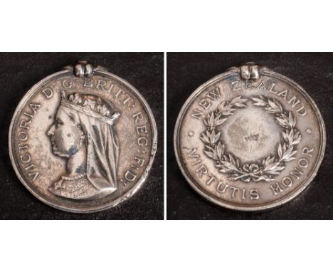 A Victorian New Zealand Medal: undated and name erased, (poor condition)