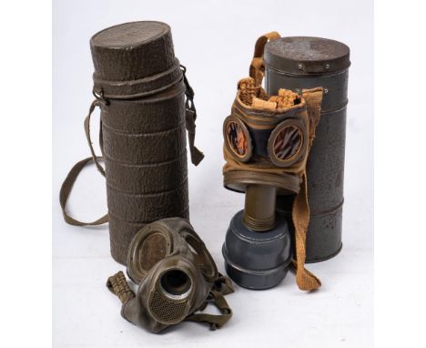 A WWII period German gas mask in container: the base stamped 'S.A.F.T  9  1939', the cover inscribed, 'Meyer, Maria A Wittens