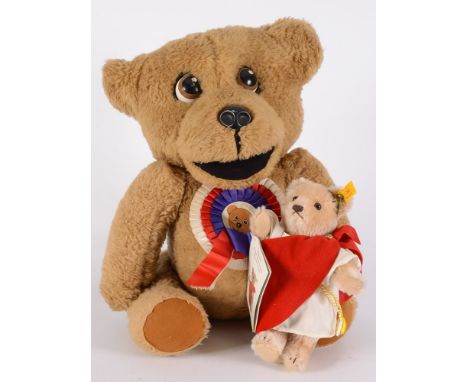 A Nooky Bear with moveable eyes and hand operated mouth:, 57cm. high, together with a Steiff Dodvoc 'Ruler of the Cotswolds' 