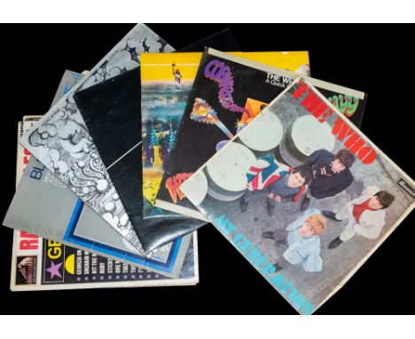 Eight vinyl albums including the first two of The WHO, together with ones by Jimi Hendrix, Cream, Pink Floyd, Ray Charles, Od