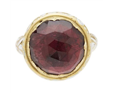 A pink tourmaline set ring collet set with a rose-cut pink tourmaline in a foil backed mount, the collar and shoulders with s