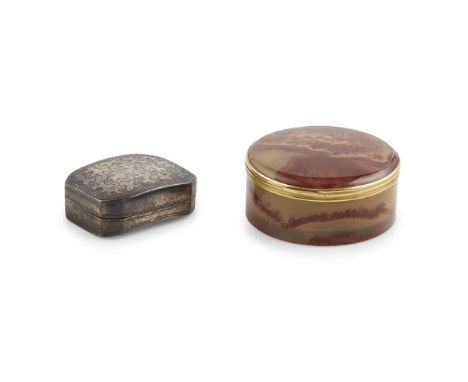 A French Agate patch box of circular outline, modelled in a banded red moss-agate, the mounts with French Eagles head marks f