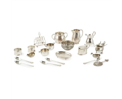 A collection of modern silver to include; napkin rings, small toast rack, miscellaneous odd cutlery, sugar and cream, Dutch s