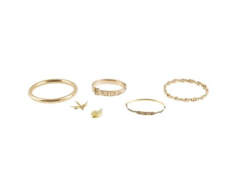 A collection of jewellery to include a hinged bangle modelled as a buckle, stamped 9ct; another set with rubies and eight-cut