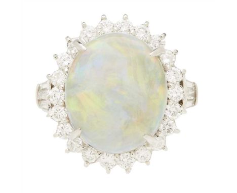An opal and diamond set cluster ring claw set with an oval opal cabochon in a single border of round brilliant-cut diamonds, 