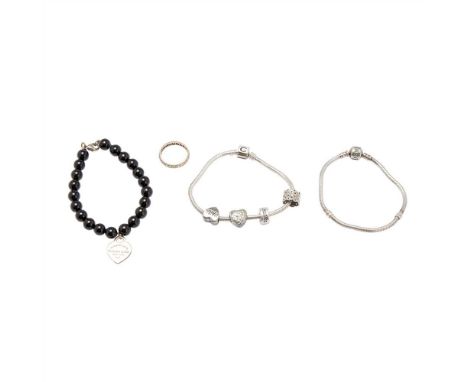 A collection of modern jewellery to include an onyx bead and heart shaped pendant bracelet, by Tiffany &amp; Co; two Pandora 