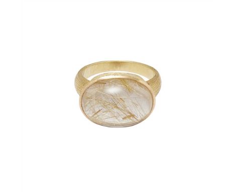A rutilated quartz set cocktail ring collet set with an oval rutilated quartz cabochon, to a textured 18ct yellow gold shank 