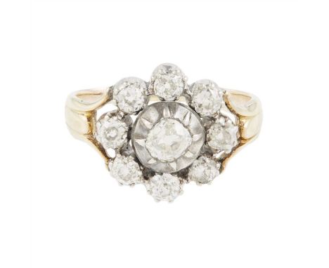 A diamond set cluster ring set with an old cushion-cut diamond in a border of claw set old round and cushion-cut diamonds, to