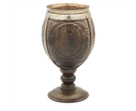 An interesting carved mounted coconut cup with Charles I connections unmarked circa 1740, the coconut carved with three panel