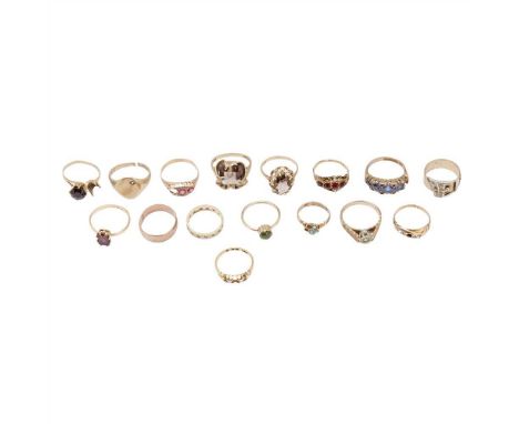 A collection of 9ct gold gem set rings to include a large citrine set cocktail ring, and another smaller example; a diamond s