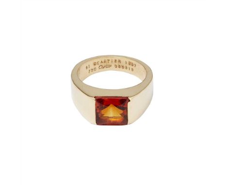A citrine set ring, Cartier gypsy set with a squared citrine cabochon, signed 'Cartier', stamped CARTIER 1997 750 656818 (Dim