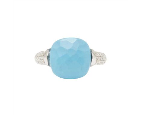 A turquoise and diamond set ring set with a faceted turquoise cabochon, the shoulders pavé set with round brilliant-cut diamo