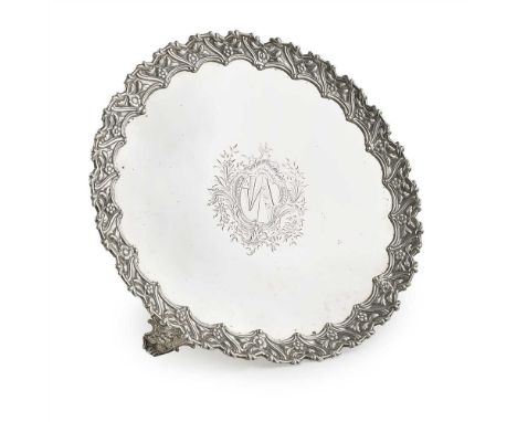 A pair of early George III salvers CH, London 1763, each of circular form, heavy cast border with floral decoration, the cent