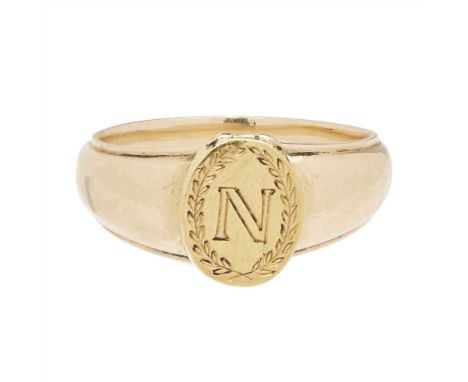 A 19th century Napoleon III portrait signet ring the hinged locket engraved with 'N' within a laurel wreath, opening to revea