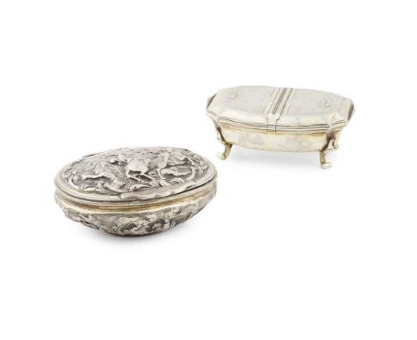 An early 19th century small table snuff box unmarked, of rectangular form, slight serpentine outline, cavetto border to the t