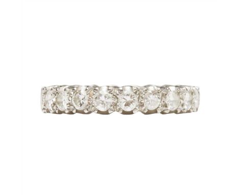 A diamond set eternity ring claw set with a single row of round brilliant-cut diamonds, unmarked (Dimensions: Ring size: O, e