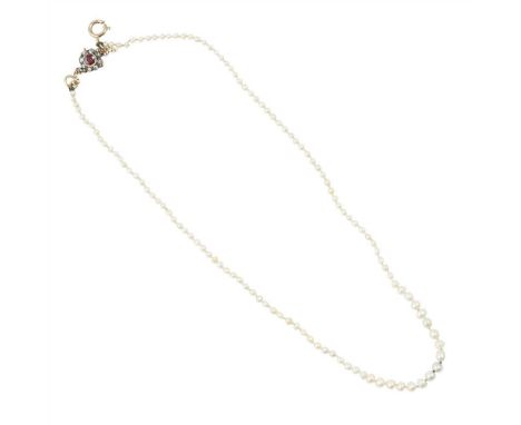 A natural pearl necklace composed of a single strand of one hundred and nineteen graduated natural pearls, to a plain bolt-ri
