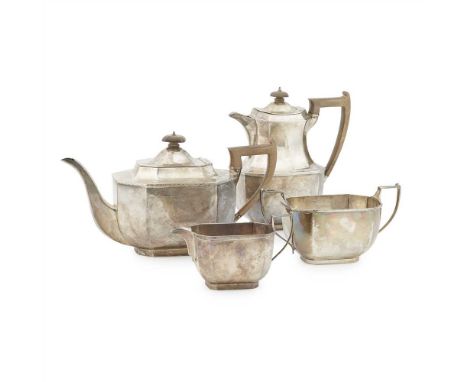 A matched four piece tea service Thomas Bradbury &amp; Sons Ltd, Sheffield 1923/4, comprising water pot, teapot, twin handled