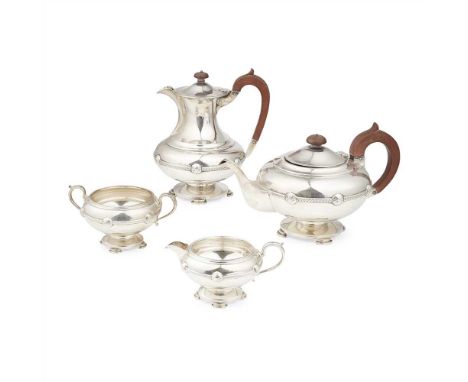 A Celtic inspired four piece tea service Martin Hall &amp; Co Ltd, Sheffield 1928, comprising, water pot, teapot, twin handle