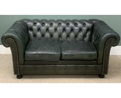 BUTTONED LEATHER/EFFECT LOW BACK SOFA, 68 (h) x 149 (w) x 56cms (d)Provenance: private collection Gwynedd