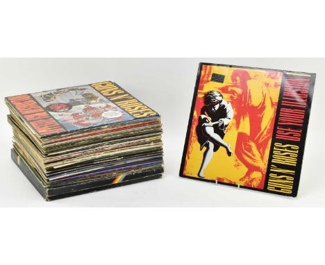 A mixed collection of approx. 40+ long play / LP vinyl record albums of varying artists and genres. The lot comprising War Th