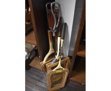 A selection of vintage tennis rackets including Slazenger and Dunlop. Also a shooting stick