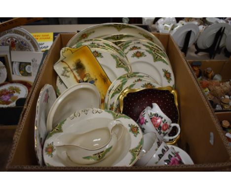 A box containing a Royal Staffordshire Pottery part dinner service with green and floral pattern a Harrowby part tea service 