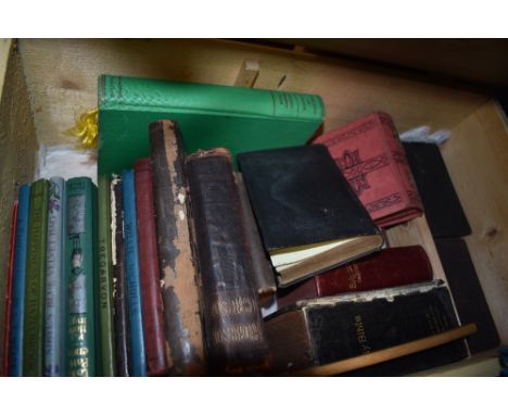 A vintage painted pine box with a selection of religious interest books.
