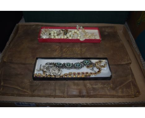 A selection of modern costume jewellery including necklaces and vintage Pyjama case