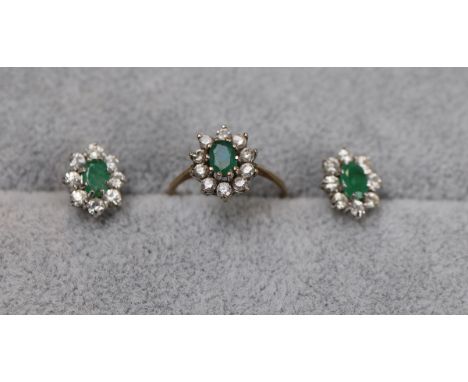 Gold emerald cluster ring with matching earrings