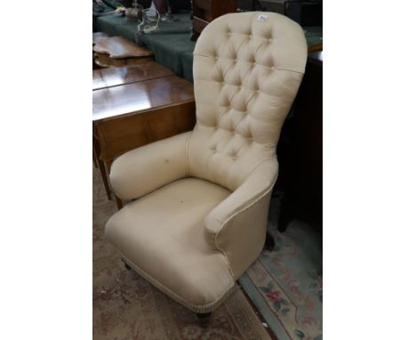 Antique button back armchair on unusual glass ball casters