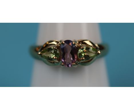 Gold peridot &amp; amethyst ring