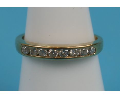 Gold 8 stone diamond set ring