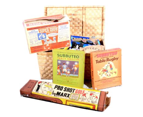Wicker toy box of vintage games and toys; including Subbuteo football and rugby set, Magic Robot, Marx golf game, plastic mil