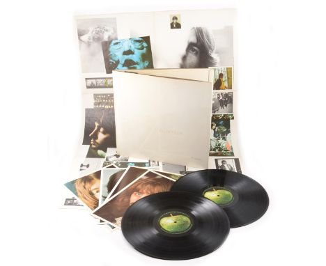 The Beatles; The White Album original numbered pressing no.0098517, with four portrait photos, poster song sheet and two viny