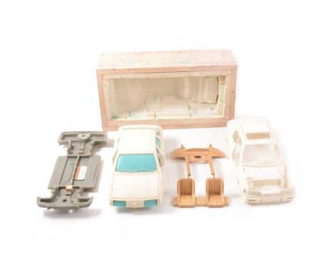 Corgi Toys prototypes and moulds, Ford Sierra and Ford Sapphire, a loose plastic shell casting 26cm, another plastic casting 