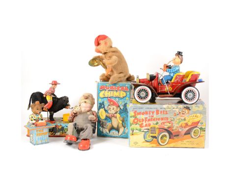 Tin-plate and early battery operated toys; including Alps Toys Musical Chimp the band leader boxed, TN Toys Smokey Bill on Ol