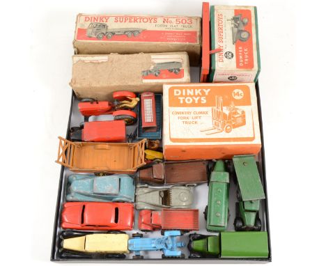 Dinky Toys; playworn loose and boxed examples, including no.503 flat truck, no.562 dump truck, 14c fork lift truck, Massey Ha
